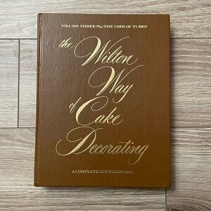 Wilton Brown Cake Decorating Cookbook with Gold Lettering